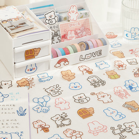 40-piece pack of cute white bunny PET stickers with pink outlines, showing the bunny in various activities like driving, fishing, and holding flowers, on a pink - Image 4