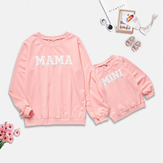 White long-sleeve adult sweater with "MAMA" text and matching child's sweater with "MINI" text. - Image 2