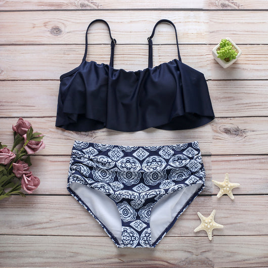 Navy blue ruffled tube top swimsuit with high-waisted bottoms featuring a white geometric pattern. - Image 23