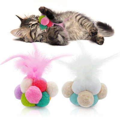 Two cat toys with white feathers and colorful pom-poms in light blue, peach, and white.
