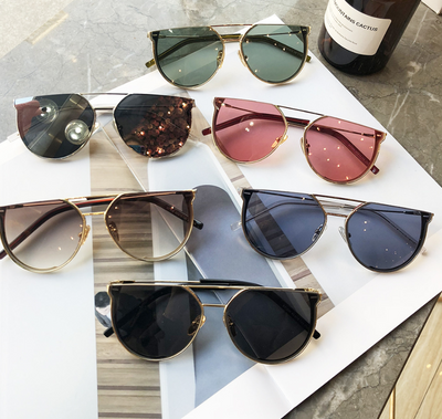 Gafas de Sol Unisex Montura Medio Marco - Diseño Moderno y Versátil