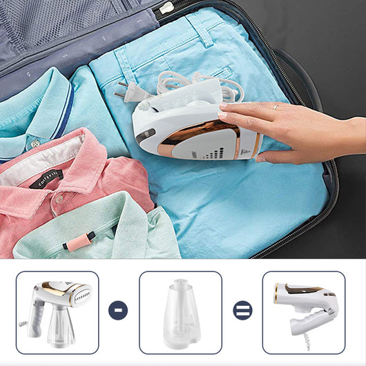 White and gold handheld folding steam iron with clear cistern, long bristle brush, fluff brush, and measuring cup.