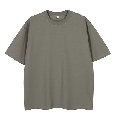 Moss green short-sleeve cotton t-shirt with a crew neck and a relaxed, oversized fit. - Image 10