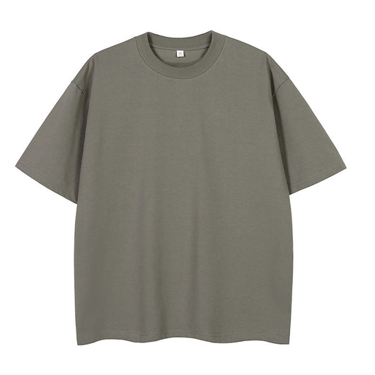 Moss green short-sleeve cotton t-shirt with a crew neck and a relaxed, oversized fit. - Image 10