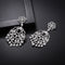 Vintage Hollowed Out Luxury Copper Micro Inlaid Zircon Earrings Platinum and Blanco
