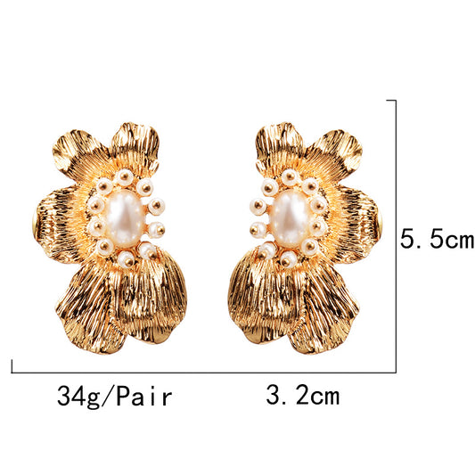 Aretes de Flores Exageradas con Metal Simétrico - Estilo Europeo y Americano - Image 2