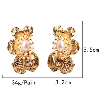 Aretes de Flores Exageradas con Metal Simétrico - Estilo Europeo y Americano - Image 2