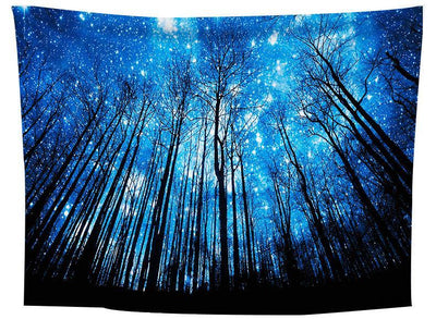 Tapestry featuring a vibrant blue starry night sky seen through a dense forest of tall, dark, bare trees. - Image 2