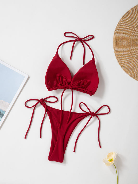 Red solid color two-piece bikini swimsuit with a halter tie-top and adjustable tie-side thong bottom. - Image 24