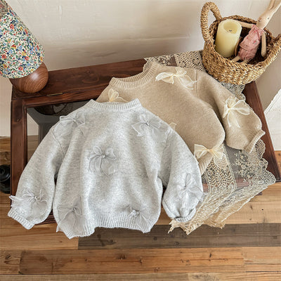 Suéter Infantil con Moño - Tejido Elegante para Niñas