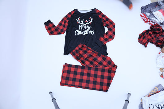 Black and red buffalo plaid pajama set with 'Merry Christmas' and reindeer antlers on the long-sleeved top. - Image 11