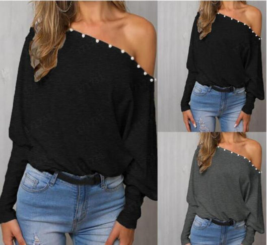 Blusa Elegante con Mangas Murciélago y Detalles de Cuentas