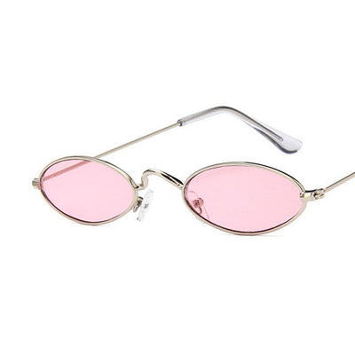 Retro oval frame sunglasses with vibrant red lenses and shiny gold-colored metal frames on a white background. - Image 15