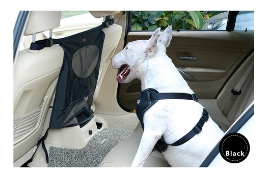 Grey pet car fence installed in a car's rear seat, separating the front and back, with a white Bull Terrier. - Image 2