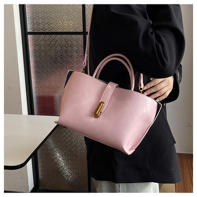 Bolso Bucket de Cuero Encerado Elegante y Portátil - Image 24