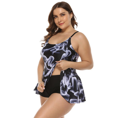 Plus size black swimdress with white and grey abstract bubble print, scoop neck, and flared skirt. - Image 5
