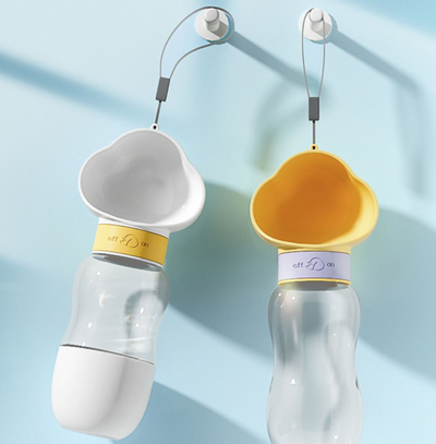 Yellow and clear portable pet water bottle with integrated drinking bowl and separate food container for walking dogs. - Image 30