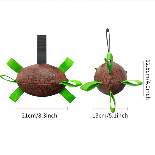 Interactive dog football toy with black and white panels, paw prints, green nylon tabs, and a green carabiner clip. Includes a black inflation pump. - Image 94