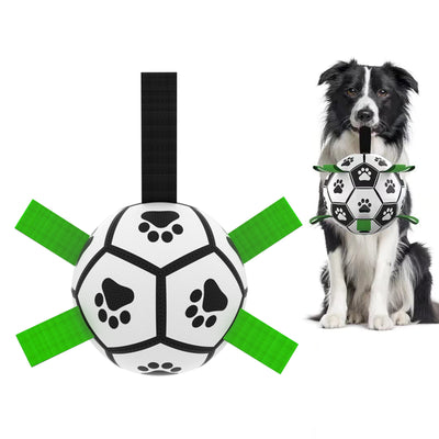 Interactive dog football toy with black and white panels, paw prints, green nylon tabs, and a green carabiner clip. Includes a black inflation pump. - Image 7