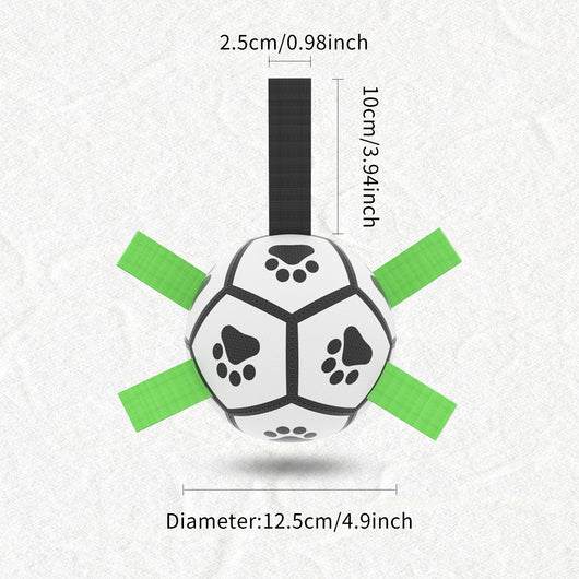 Interactive dog football toy with black and white panels, paw prints, green nylon tabs, and a green carabiner clip. Includes a black inflation pump. - Image 15