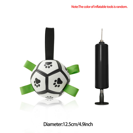 Interactive dog football toy with black and white panels, paw prints, green nylon tabs, and a green carabiner clip. Includes a black inflation pump. - Image 35