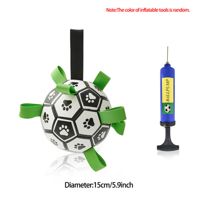 Interactive dog football toy with black and white panels, paw prints, green nylon tabs, and a green carabiner clip. Includes a black inflation pump. - Image 39