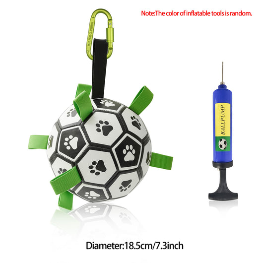 Interactive dog football toy with black and white panels, paw prints, green nylon tabs, and a green carabiner clip. Includes a black inflation pump. - Image 51