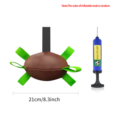 Interactive dog football toy with black and white panels, paw prints, green nylon tabs, and a green carabiner clip. Includes a black inflation pump. - Image 59