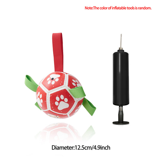 Interactive dog football toy with black and white panels, paw prints, green nylon tabs, and a green carabiner clip. Includes a black inflation pump. - Image 66