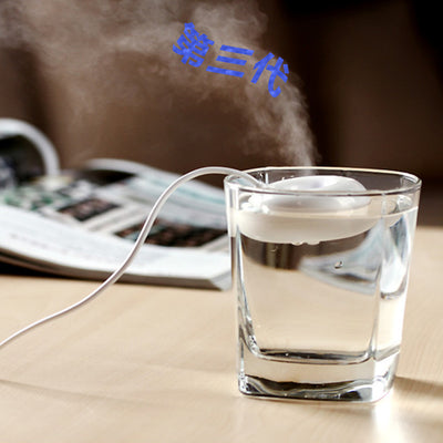 Bright blue donut-shaped mini portable USB air humidifier purifier with a white central filter and silver button. - Image 6