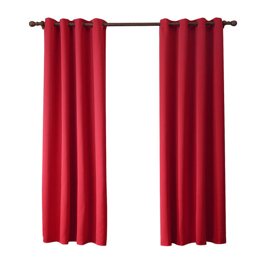 Red Oxford cloth curtain with metal grommets hanging on a decorative wooden rod against a gray wall. - Image 2