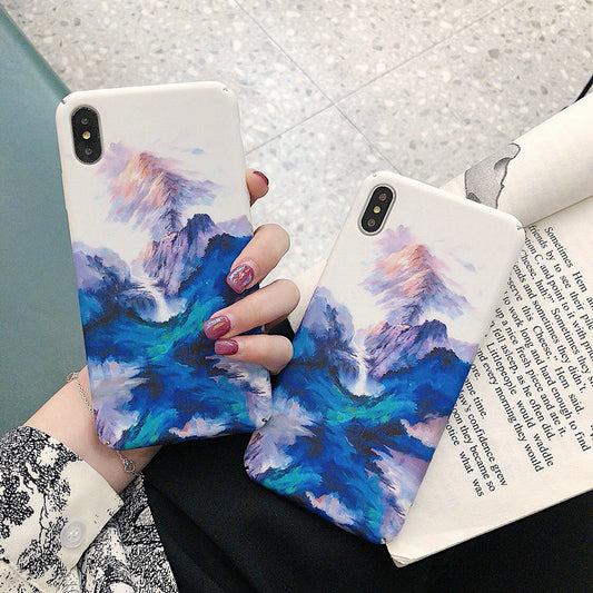 Funda para teléfono azul oscuro con detalles coloridos
