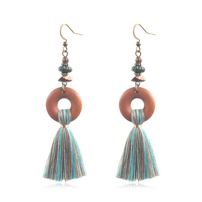 Aretes de Madera con Borla Elegante - Image 5