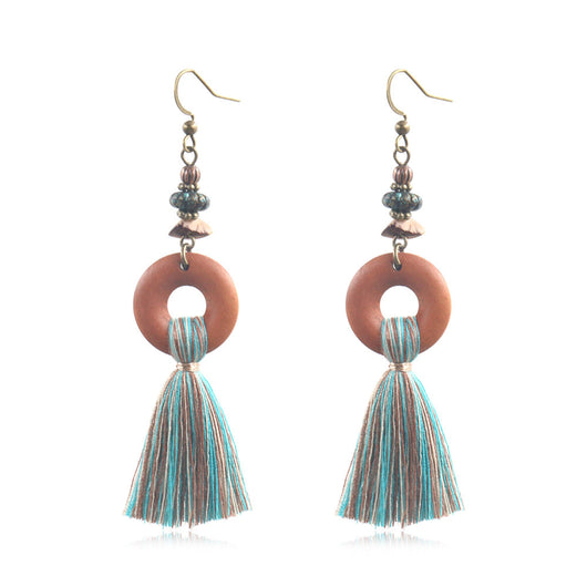 Aretes de Madera con Borla Elegante - Image 5