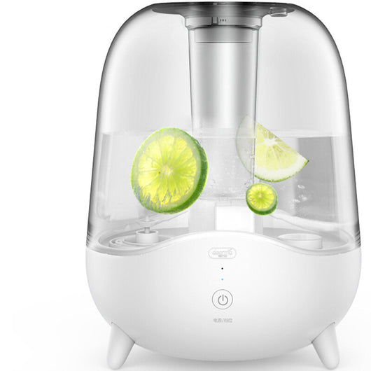 White and clear household silent air humidifier emitting mist, with lemon slices visible in the transparent water tank. - Image 5
