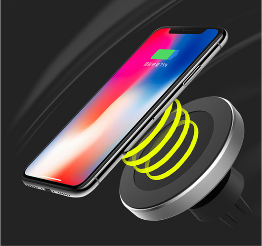 Silver and black car magnetic wireless charger with a blue indicator light, mounted on a car's air vent. - Image 6