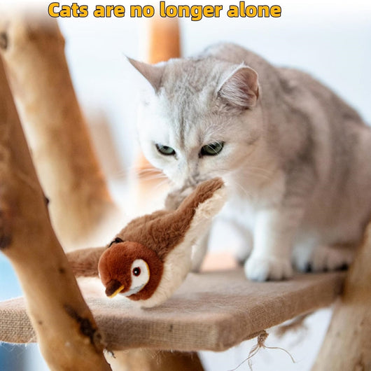 Plush brown and white bird cat toy with yellow accents, a feather tail, and a black clip on its back. - Image 9