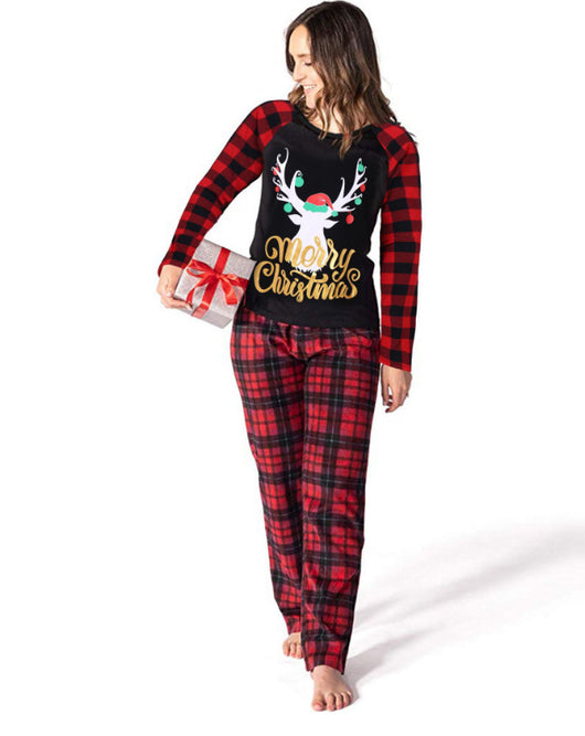 Men's Christmas pajama set with a black long-sleeve top featuring a reindeer and "Merry Christmas" text, paired with red plaid pants. - Image 6