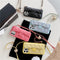 Funda para iPhone con Cadena Dorada y Bola Decorativa
