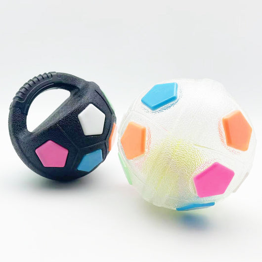 Black and white soccer ball dog toy with a textured handle, designed for interactive play and self-amusement. - Image 15