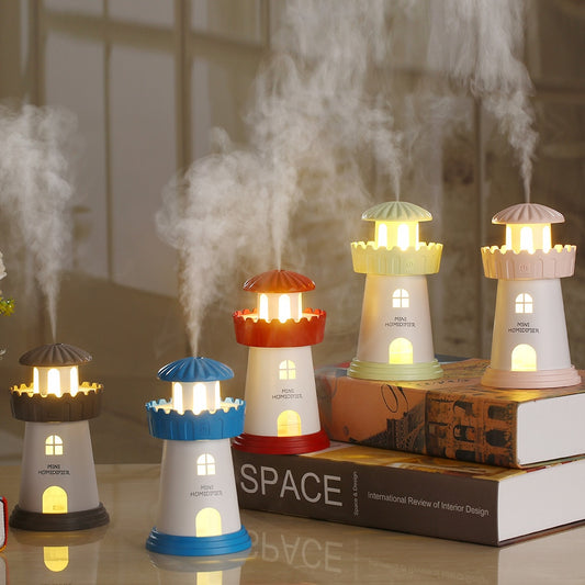 Blue and white lighthouse-shaped mini humidifier with a power button, decorative windows, and a door.