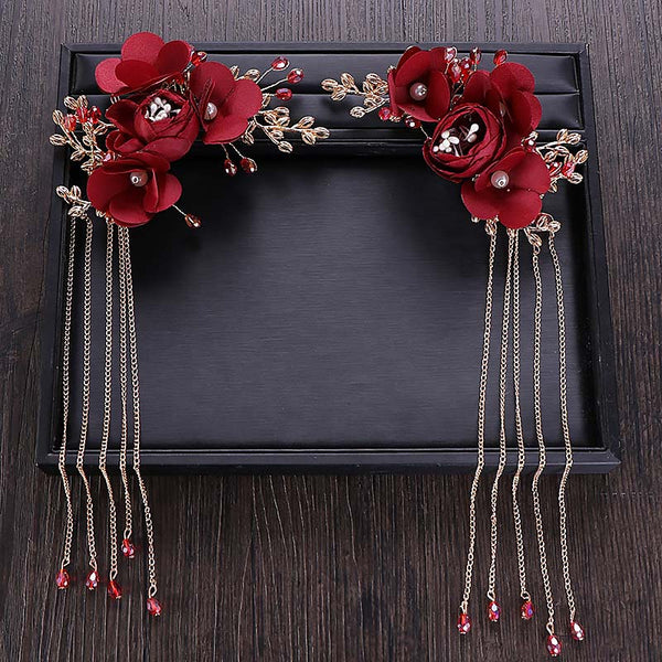 Tocado nupcial con flores rojas y horquilla china