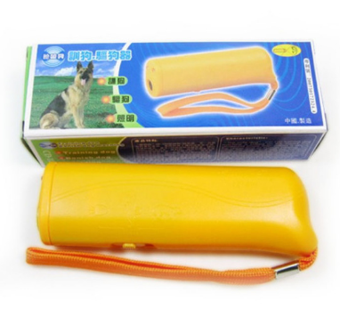 Yellow and black ultrasonic dog training devices with wrist straps, one in retail packaging. - Image 20