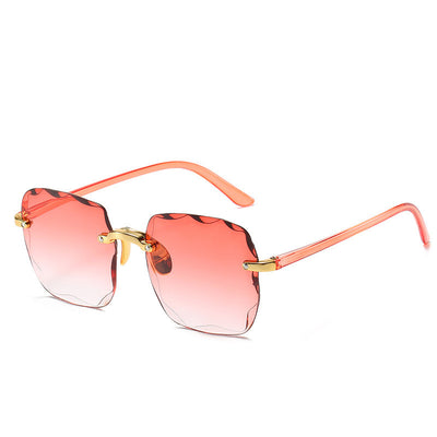 Pink rimless square sunglasses with wavy edges, gold-tone hardware, and clear pink temples on a white background. - Image 24