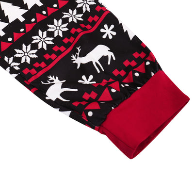 Family of four in black and red matching Christmas pajamas with Santa hat tops and fair isle pants. Also shown: a two-piece set and a baby romper. - Image 5