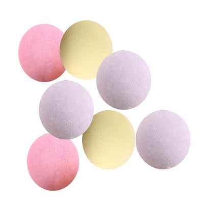 A single, round, light green bath bomb with a slightly textured surface, ready for a relaxing bath. - Image 4