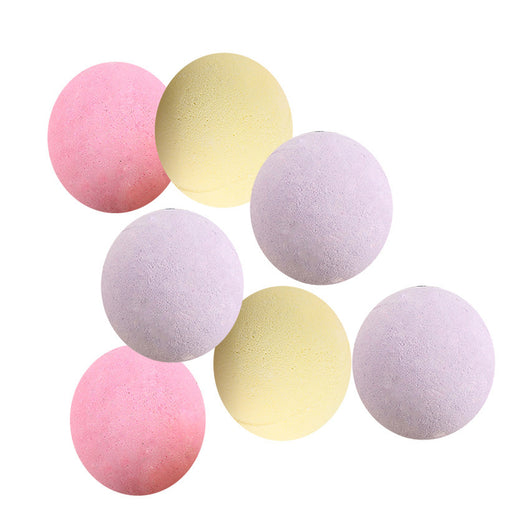 A single, round, light green bath bomb with a slightly textured surface, ready for a relaxing bath. - Image 4