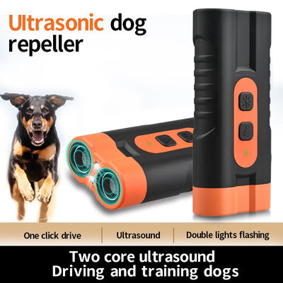 Black and orange handheld ultrasonic dog repellent with two sound emitters and two control buttons. - Image 3