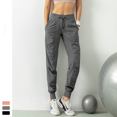 Pantalones deportivos ajustables para running y fitness - Image 13