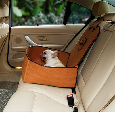 Light grey pet car seat with brown trim on a car's front passenger seat, holding two small dogs. Includes a black pet seatbelt tether. - Image 3